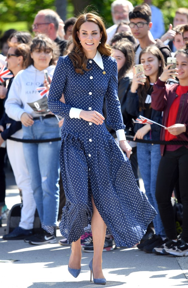  On paper, an ankle-skimming, polka dot shirt-dress shouldn’t work, but thanks to the oversized collar, cuffs and drop waist, her Alessandra Rich number is stylish and spot-on