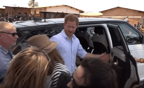  Prince Harry gestured for the reporter to move away and scolded her 'behaviour'