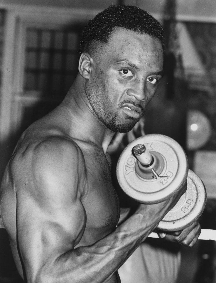  A photo taken in 1987 shows a toned Benn with hair lifting weights