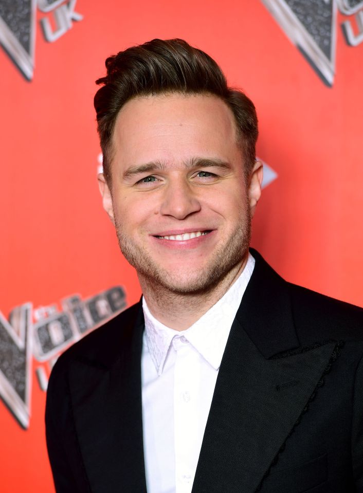  Olly was known for his brown locks. Pictured in 2018