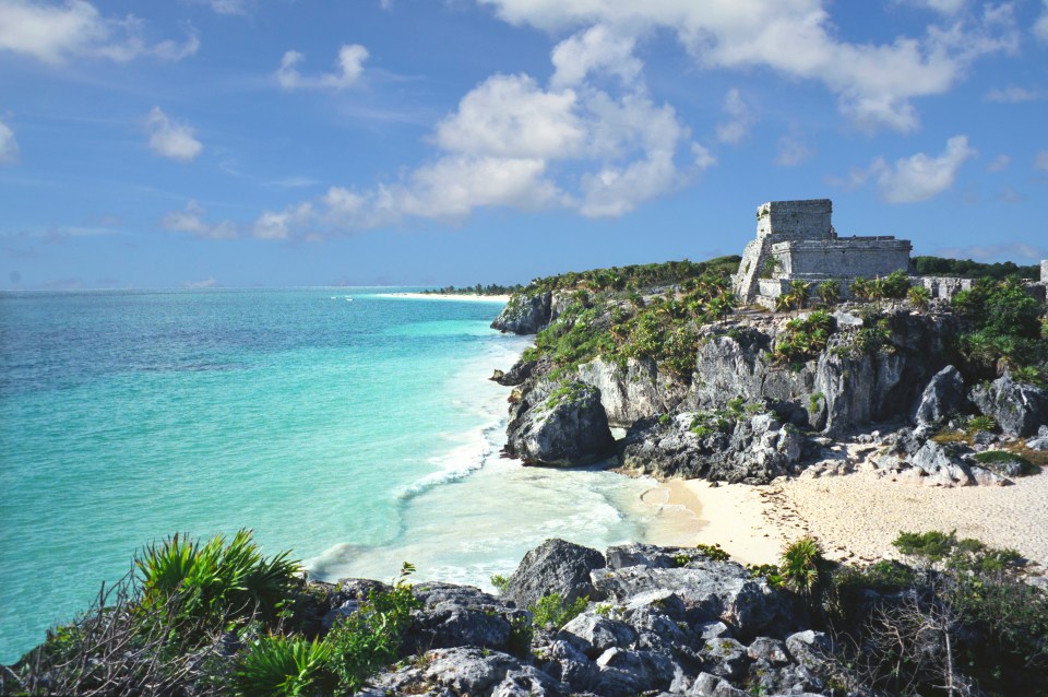  Explore Tulum a Mayan archeology site on the coast, south of Cancun