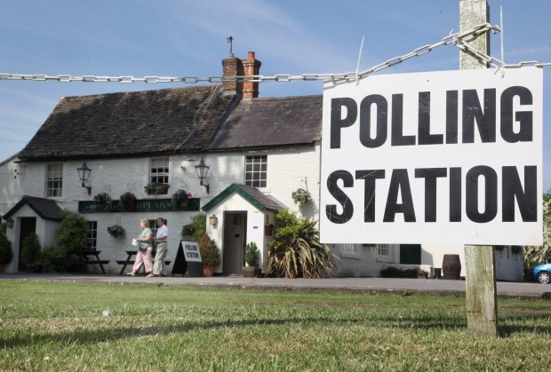 Voters leave The Poplars Inn after voting