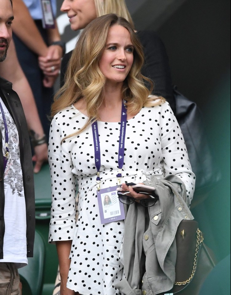 Kim was all smiles at Wimbledon despite being pregnant as she watched hubby Andy in the mixed doubles