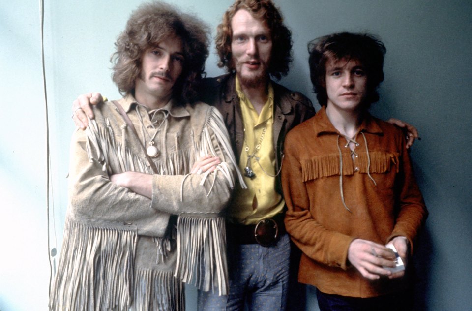  Pictured, Baker (centre) with band mates of Cream