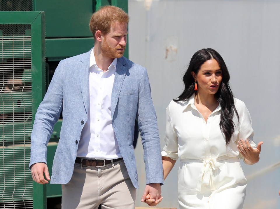  The protective prince kept a close hold of his bride as they went about their business