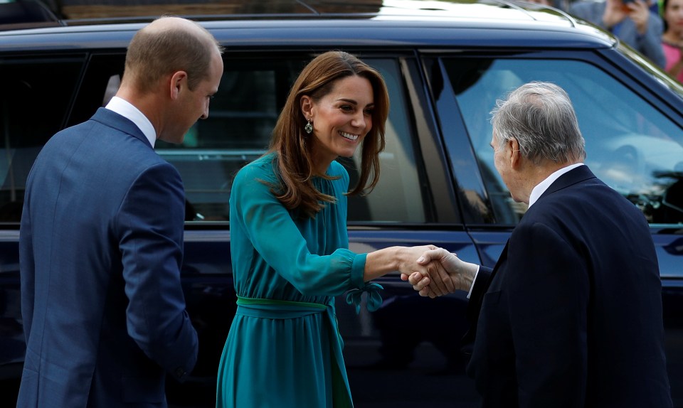  Kate Middleton shakes hands with the Aga Khan in London