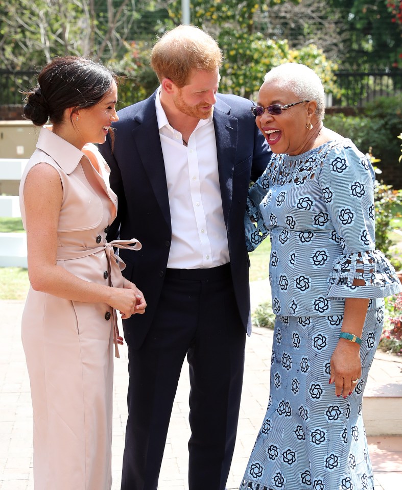  Harry and Meghan beamed as they met with Nelson Mandela's widow Graca Machel in Johannesburg