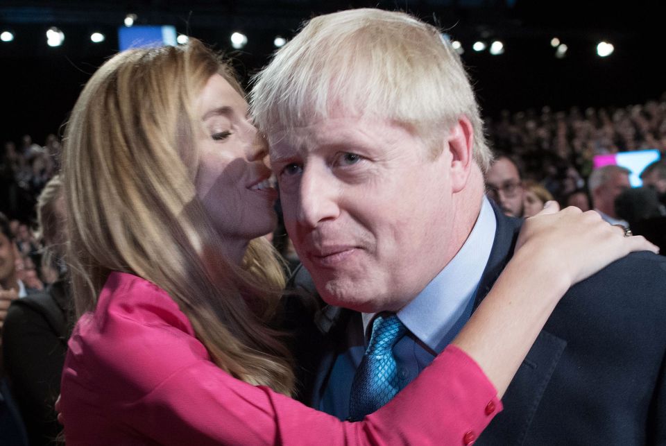  The PM shared a less awkward kiss with his girlfriend Carrie Symonds after his big speech