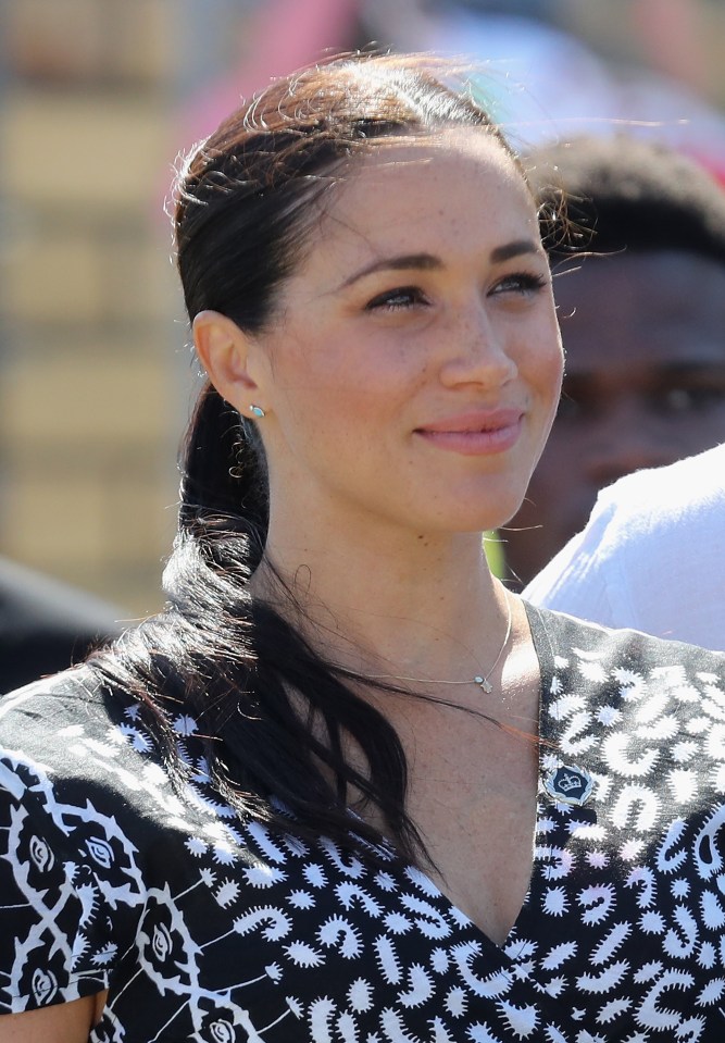 The Duchess also wore a £450 necklace bearing the ‘hamsa’ hand and ‘evil eye’ symbols