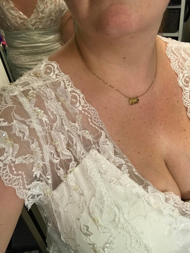 A woman shared a selfie to Reddit in a wedding dress her mum deemed to be ‘immodest’ as it showed off too much cleavage