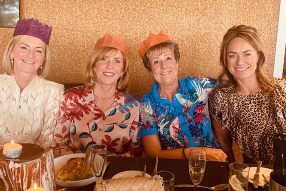 The family got in the festive spirit with crackers and party hats