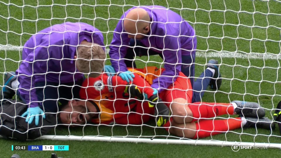  The medics attempted to stabilise the joint as Tottenham star Lloris writhed in pain