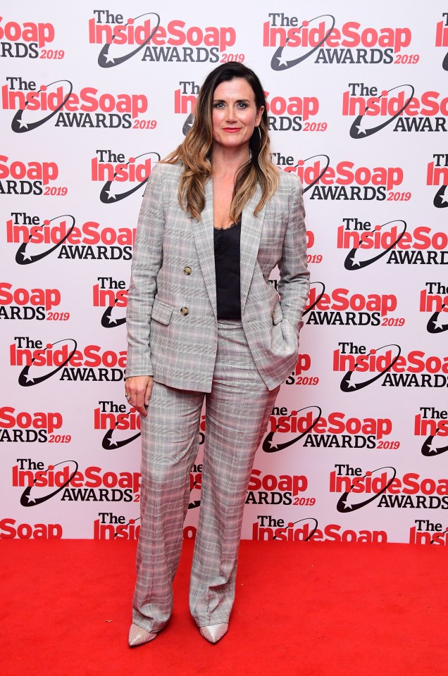 Dawn Steele looked sharp in a checked suit