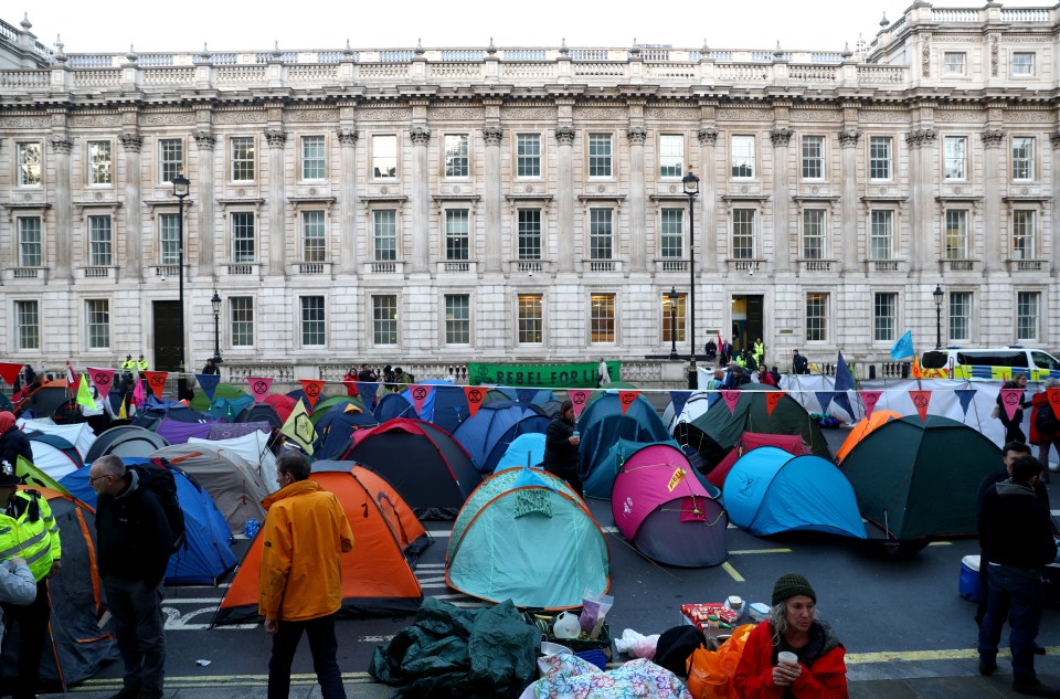  Extinction Rebellion protesters demonstrate at Whitehall on Tuesday morning