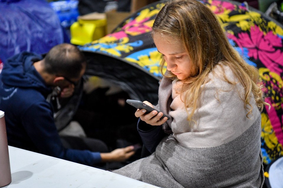  A young activist takes part in the Extinction Rebellion takeover of the meat market