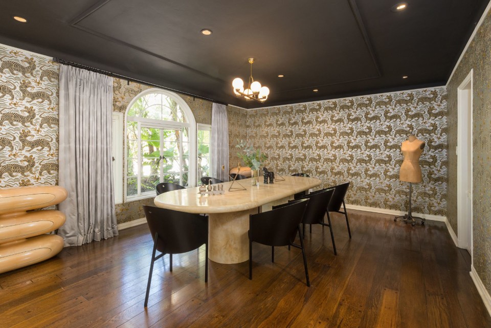 Mark’s eccentric decor choices include dragon print wallpaper in the dining room