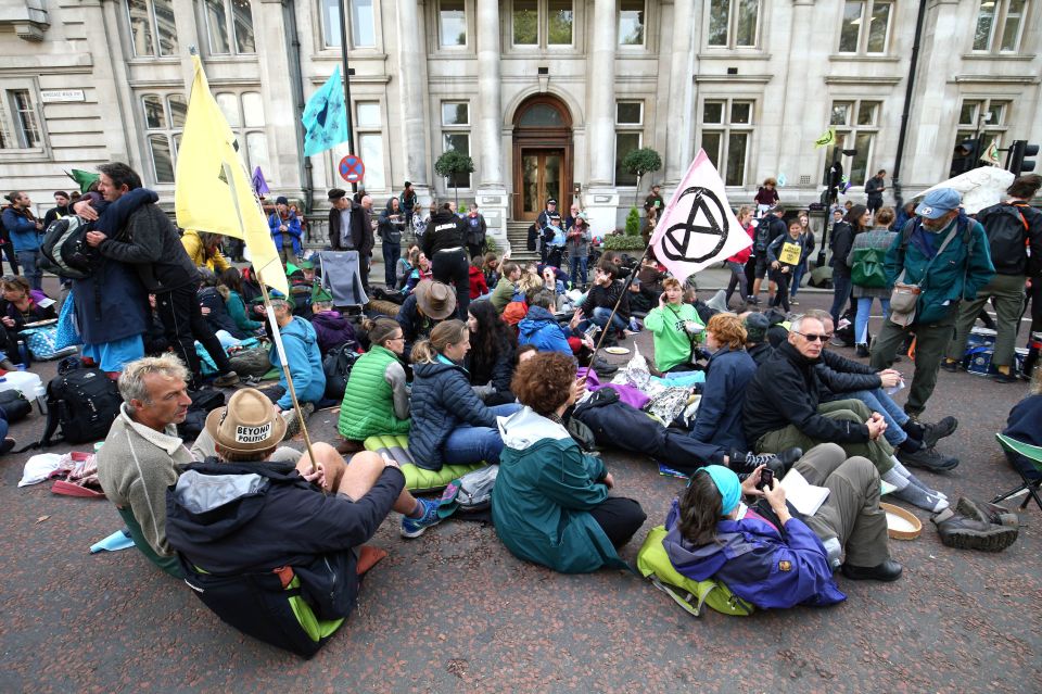  Activists on Birdcage Walk, outside the Institute of Mechanical Engineers, during the third day of an Extinction Rebellion protest