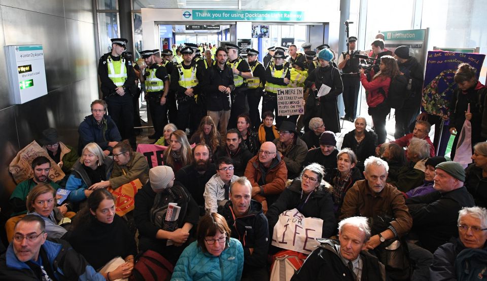  Activists blocked the entrance to the airport from the DLR yesterday