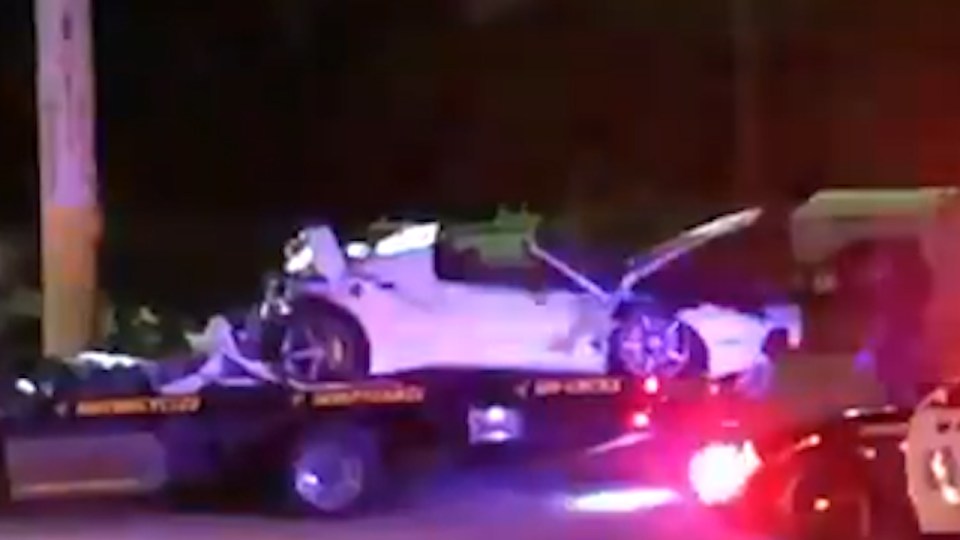 The wreckage of the Ferrari was loaded onto a tow-truck in Dallas