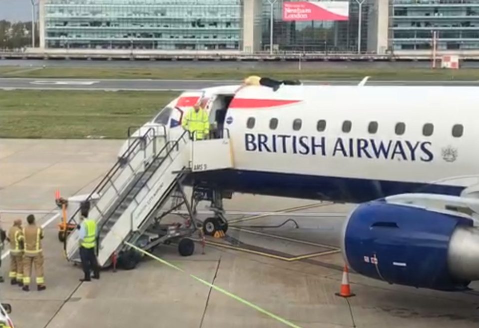  Former Paralympic athlete James Brown laying on top of an aircraft