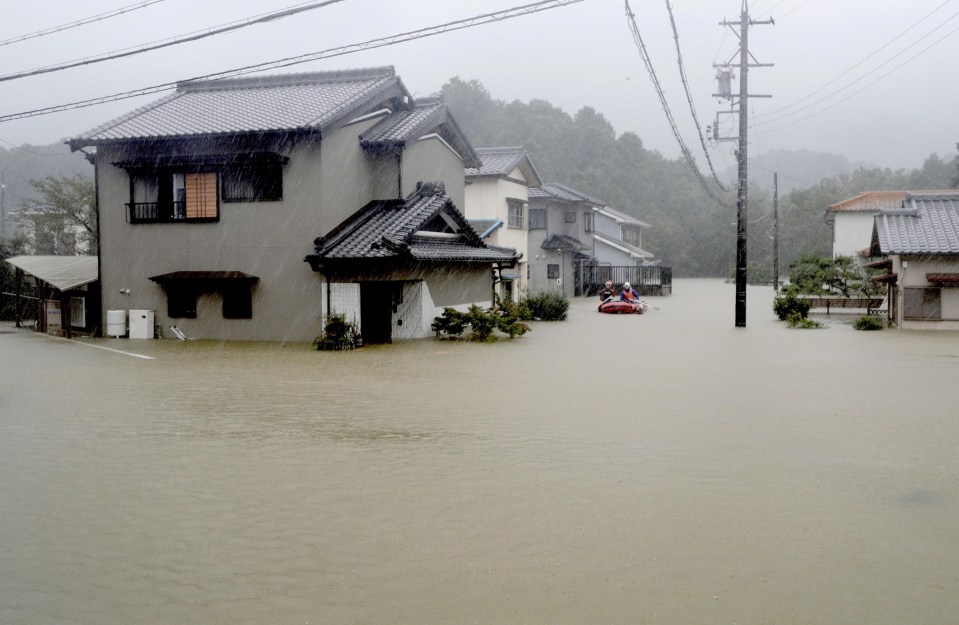  Heavy rains caused by Typhoon Hagibis flood a residential area in Ise, central Japan