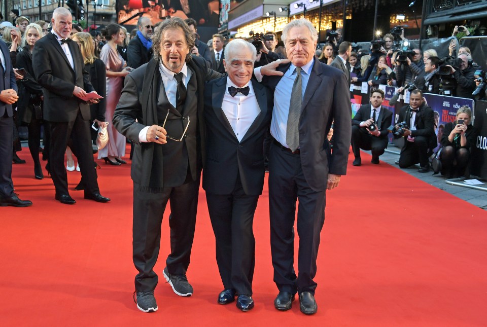  The actors posed up with director Martin Scorsese on the red carpet