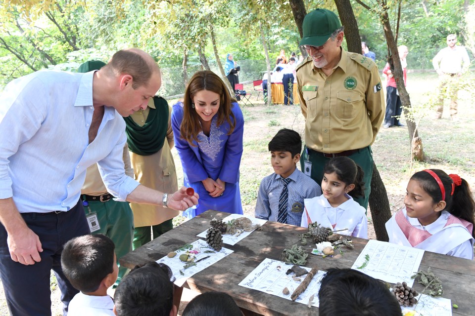  The Duke and Duchess join children to set up a leopard camera trap and help them to identify and remove species of plants that are threatening the natural environment