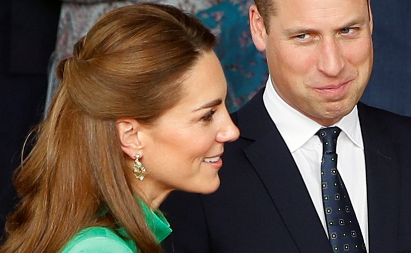  Prince William looks lovingly at Kate as they meet Imran Khan