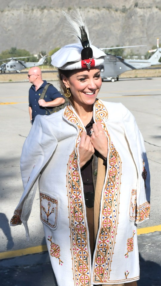 Kate is resplendent in the traditional dress of the region 