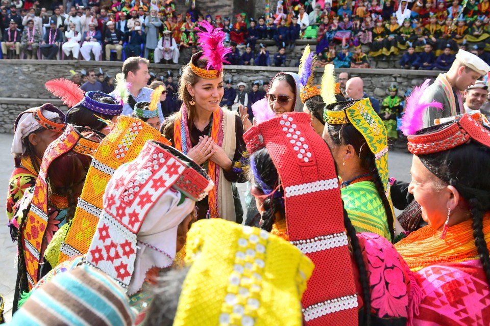 Kate was also given a feathered headdress while learning about the culture of the Kalash people