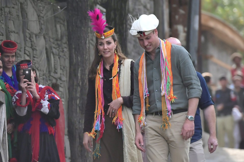 Wills and Kate both wore traditional hats on a walk bout the mountain village