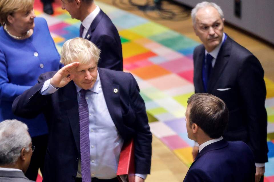  Boris giving French PM Macron a salute today