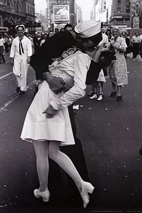  In third was the historic picture of a US Navy sailor and a young woman locked in a passionate embrace in Times Square