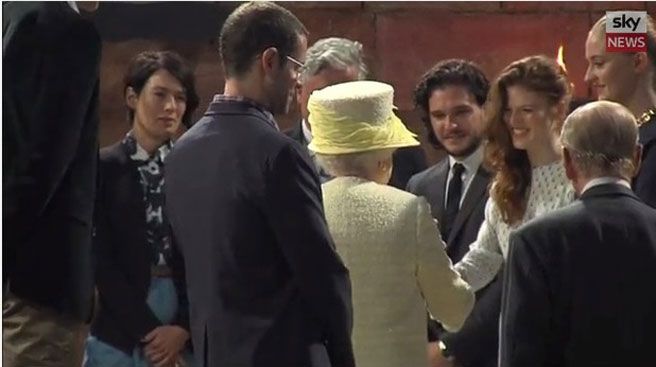 According to the actor (pictured with now-wife Rose Leslie greeting Her Majesty), she asked him what he did on the show