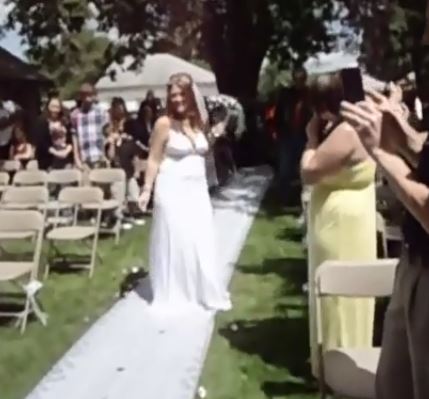 A bride has been shamed for making her way down the aisle to Buckcherry’s Crazy B****