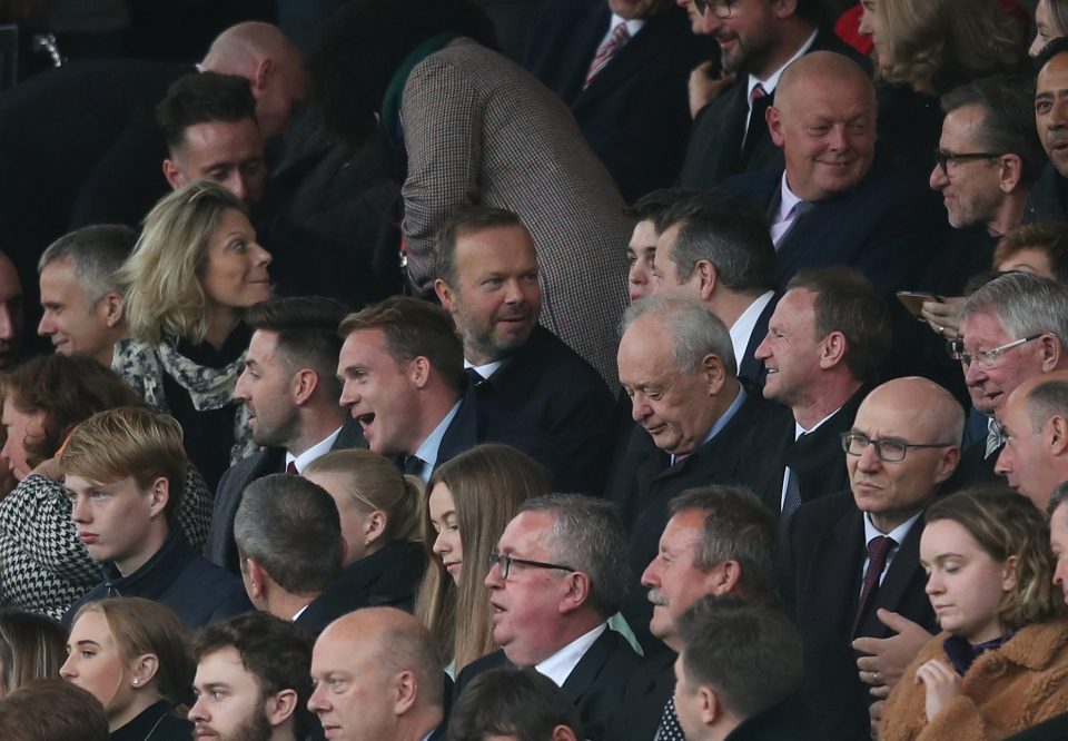  Woodward seemed to be having a good time in the stands despite the aerial protest