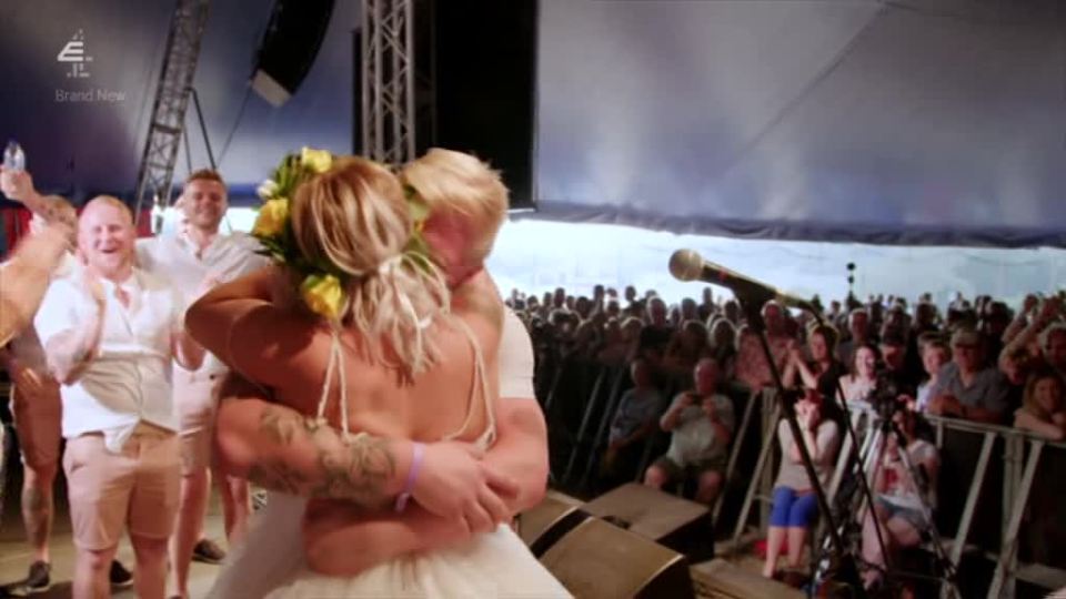  The couple tied the knot in front of 7,000 festival-goers