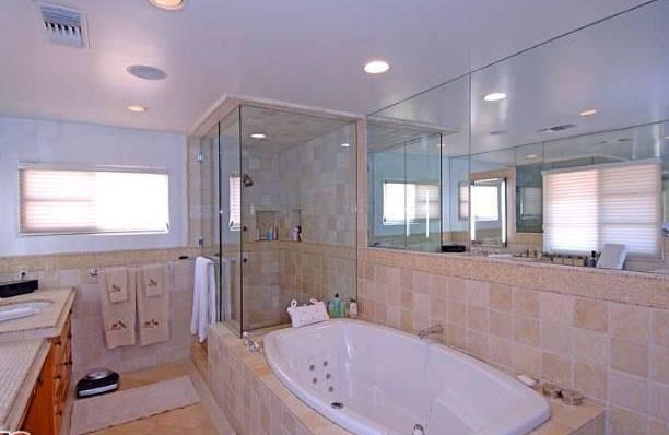  One of the bathrooms includes a whirlpool tub