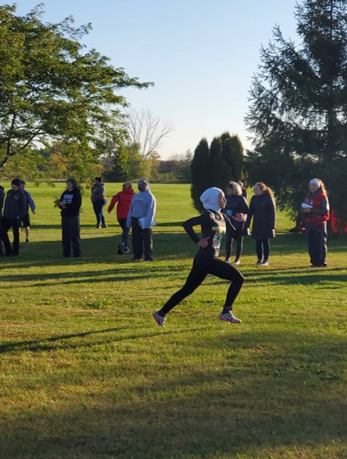  Noor, a junior on the school's cross-country team, runs in a specially-designed Nike hijab