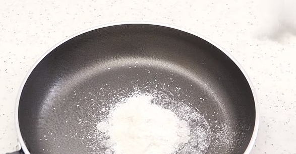 Next, he added the powder to a pan with water