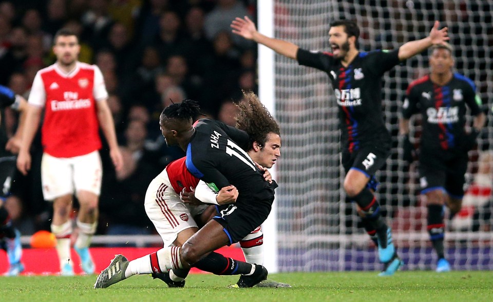  The Arsenal star received just a yellow card for his challenge on the Crystal Palace winger