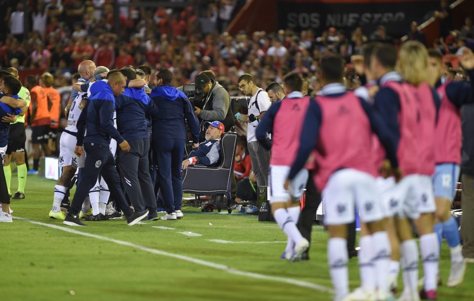  Maradona celebrates with his team after the third goal goes in