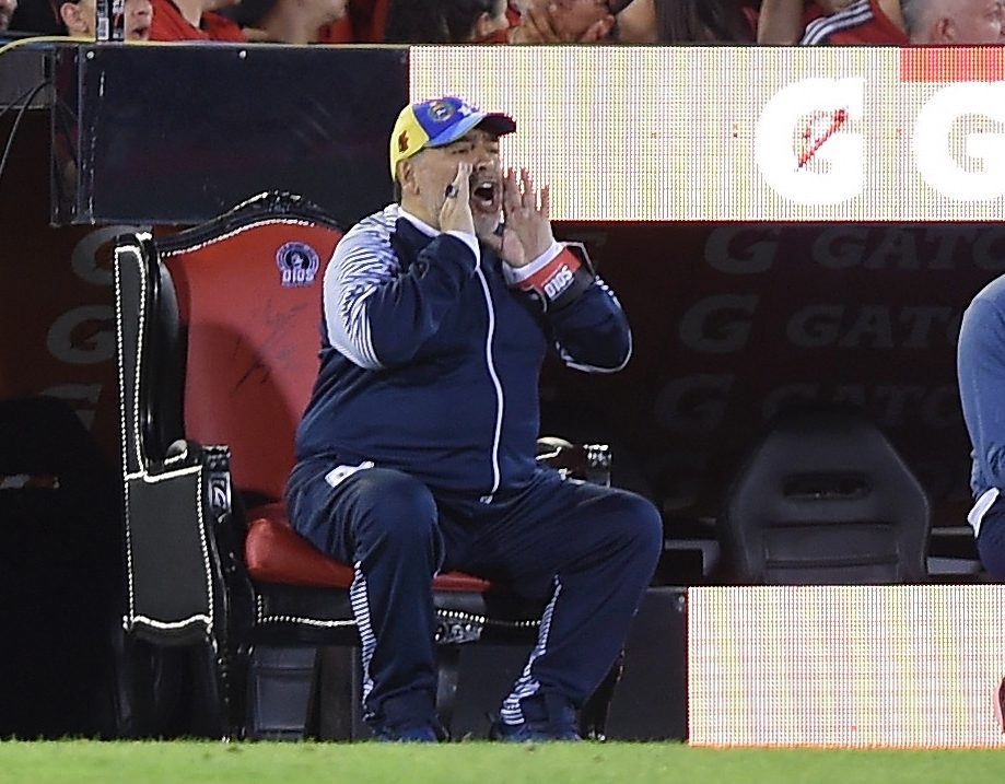  Maradona barked instructions at his players from his special seat