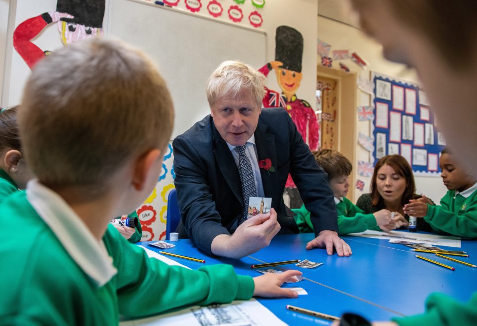  The Tory leader showed a young lad a picture of his office, The Palace of Westminster during the visit