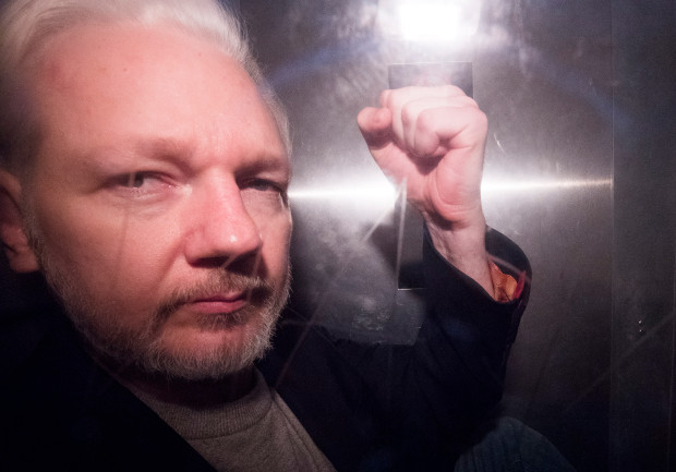  Assange is now being held in a London jail and awaiting an extradition hearing next year