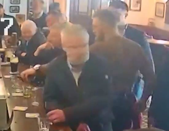 Seconds before Conor McGregor had been pouring his pals a glass of whiskey