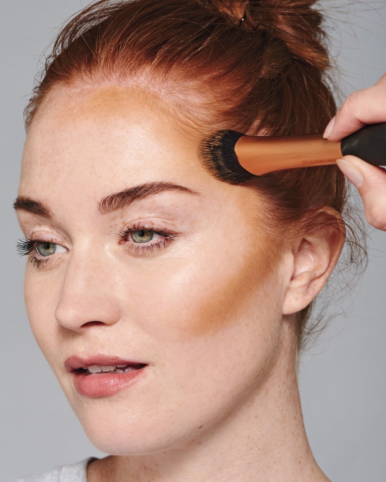  Apply the bronzer cream sweeping it in a 'C' section from your cheeks towards your temples