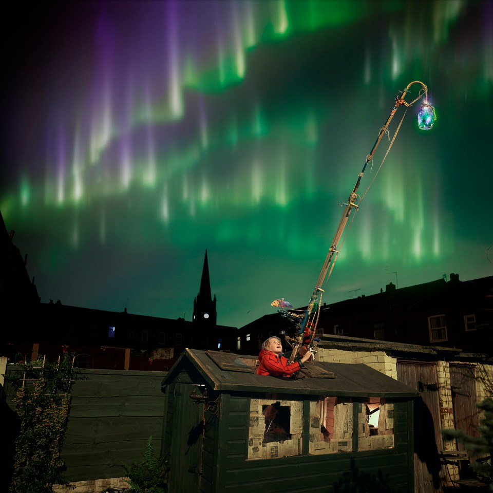 Tilly uses her grandfather’s walking stick to scoop some of the northern lights magic out of the sky