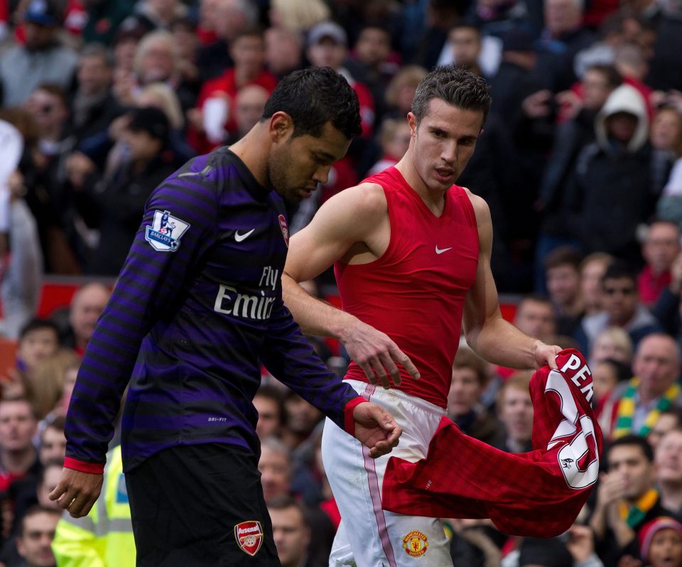  Andre Santos swaps shirts with former teammate Robin Van Persie on their way down the tunnel at half-time