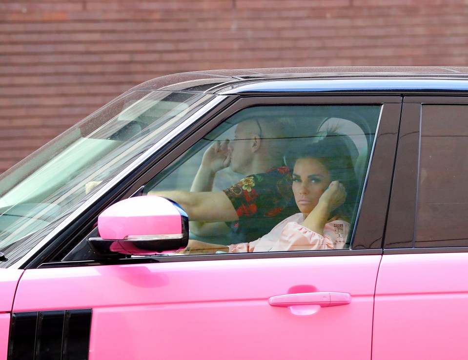 Katie Price in her bright pink Range Rover